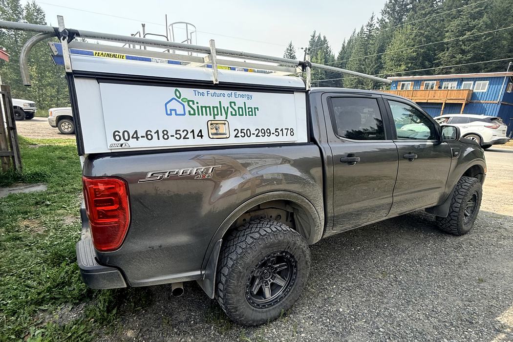 Simply Solar Ranger with ladder rack and branded canopy.